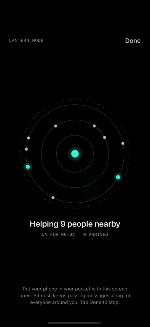 Lantern mode: a dark screen with a glowing ring helping 9 people nearby
